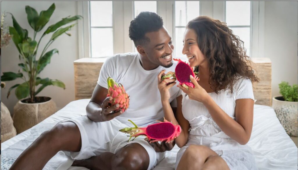 Couple with red dragon fruit